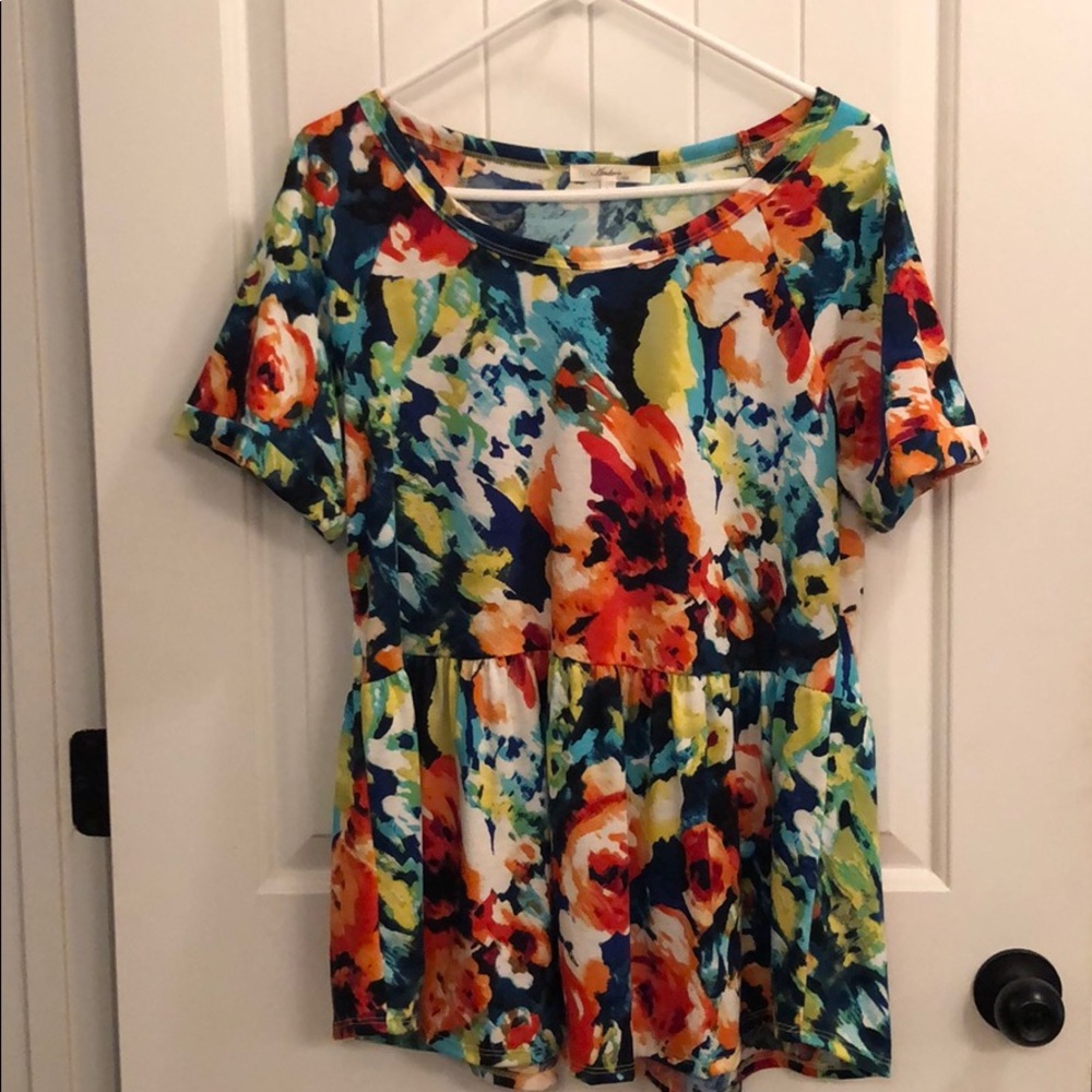 Mutilcolored floral peplum top